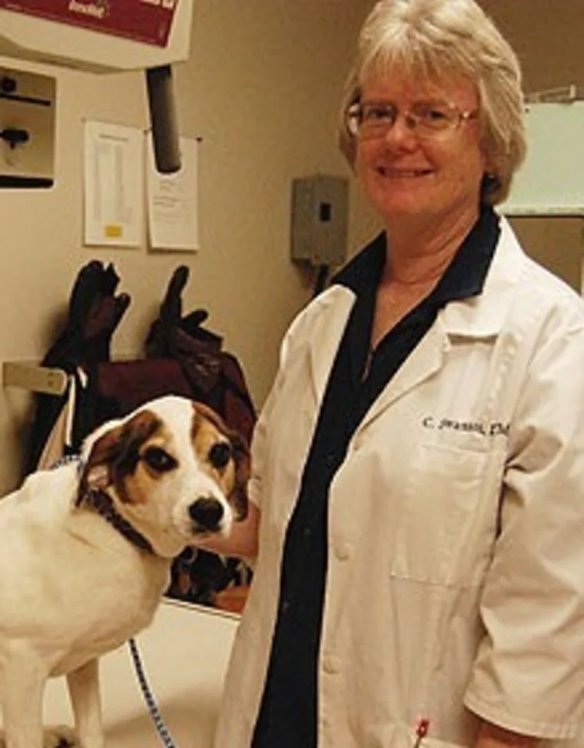 Dr. Christina Swanson WITH A DOG